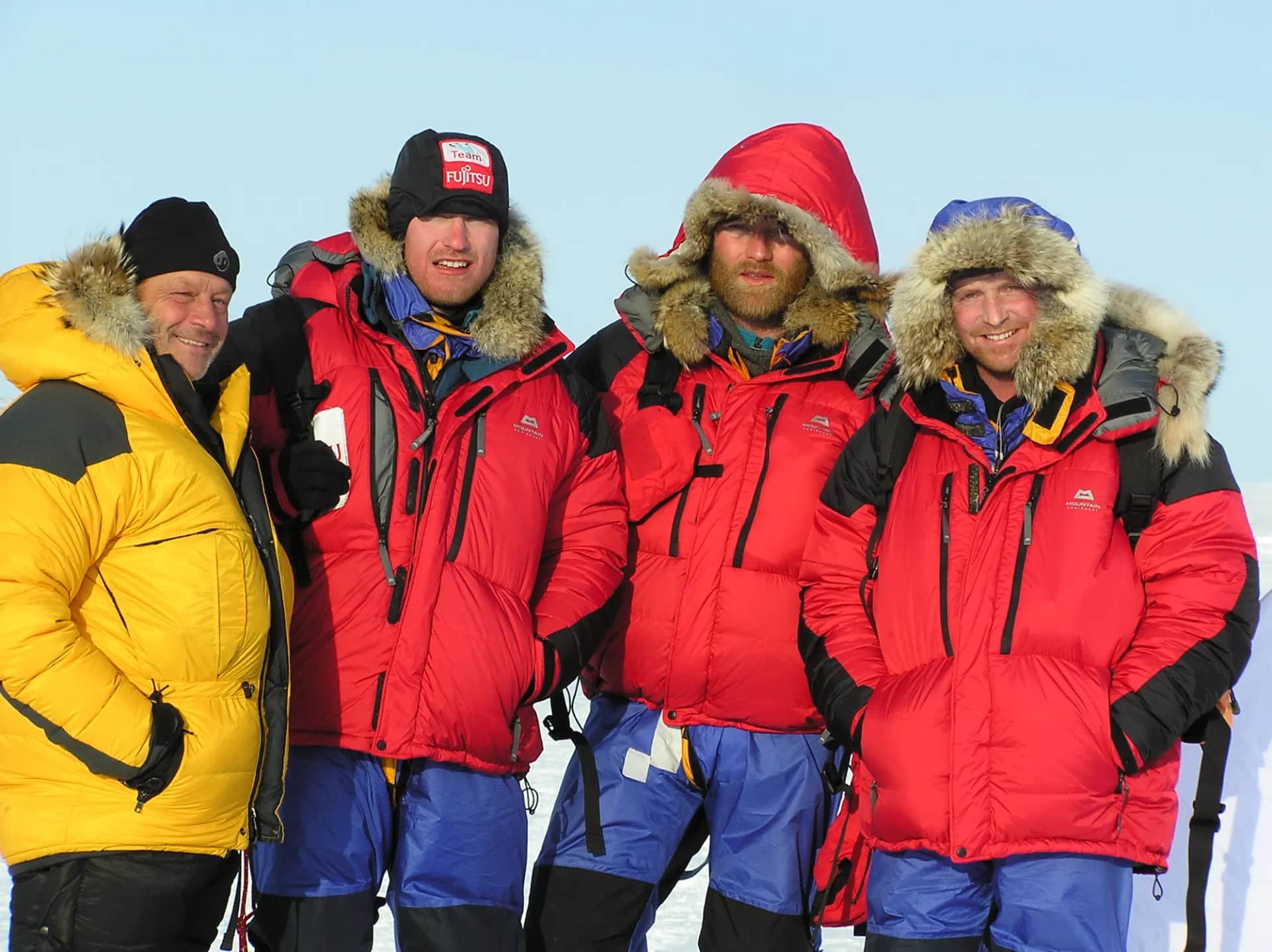 What is the cockpit gradient, and how does it affect drilling safety?. Four people in polar expedition clothing standing together on the ice